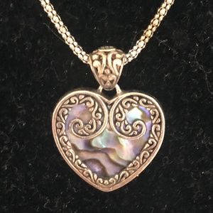 Reversible heart necklace